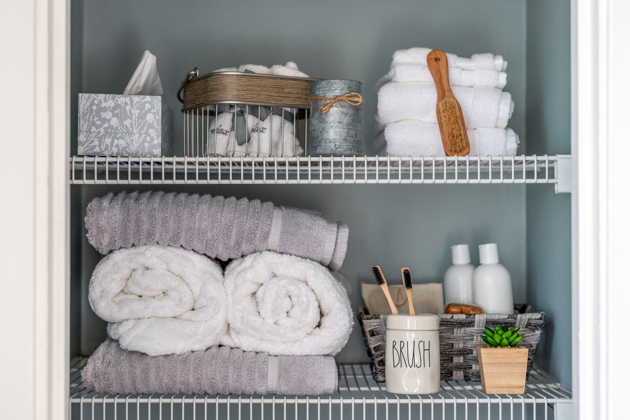 Neatly organized bathroom linen closet